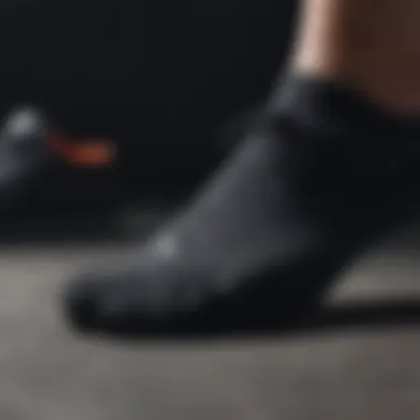 Material Quality in Black Nike No Show Socks Close-up of Nike no show socks showcasing material texture