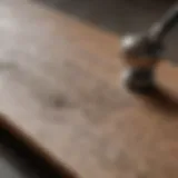 Embossing tool creating intricate design on skateboard