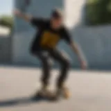 Skateboarder performing a trick wearing the black and yellow shirt