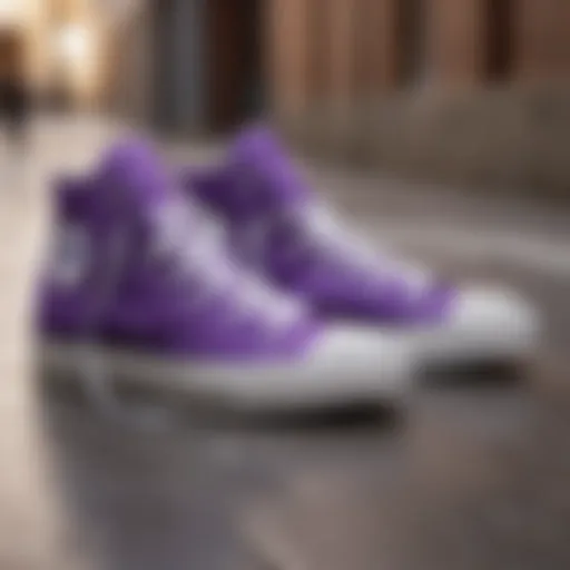 Purple Converse high tops on a skateboard