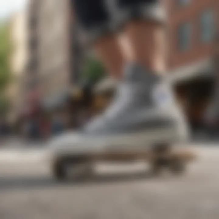 Skateboarder performing a trick while wearing Gray High Top Converse Platform