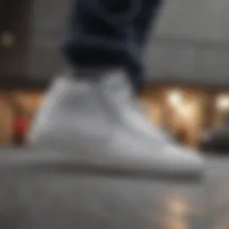 Minimalistic grey and white Nike Blazers with skateboard in the background