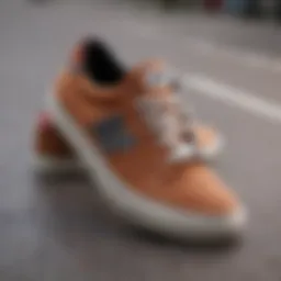 A stylish pair of New Balance deck shoes on a skateboard