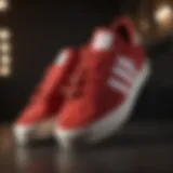 A close-up of red suede Adidas sneakers showcasing texture and design.