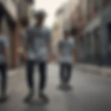 Group of skateboarders wearing grey graphic t-shirts