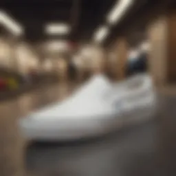 Vans Slip-On skate shoes in white on a skateboard