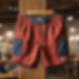 Fashionable board shorts hanging on a wooden hanger