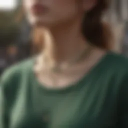 Green long sleeve t-shirt styled with layered necklaces