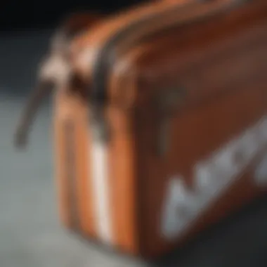 Artisanal Craftsmanship: Nike Shoulder Bag Detailing Nike shoulder bag showcasing intricate detailing
