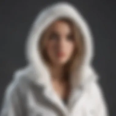 Opulent Touch: Faux Fur Accented White Hooded Jacket Luxurious White Hooded Jacket with Faux Fur Trim