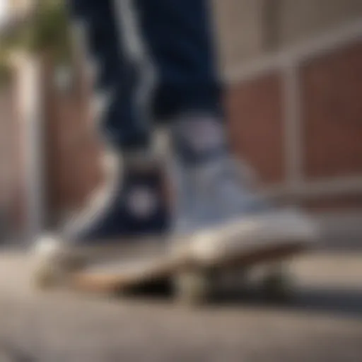 Navy high top Converse on skateboard deck