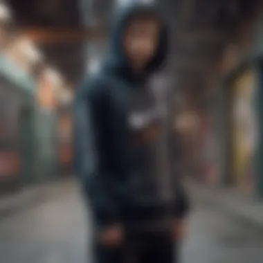 Fit of the Nike SB GFX Hoodie in Action Model wearing the hoodie in an urban skate setting.