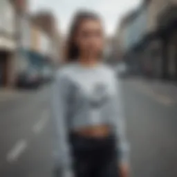 Stylish Nike sweater crop top worn by a skater in an urban setting