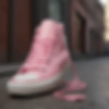 Fashion Meets Functionality A fashion-forward display of Pink Converse size 2 paired with streetwear.
