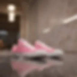 Pink and White Converse shoes on marble background