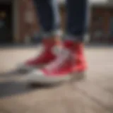 Classic Red Converse Chuck Taylors on a skateboard