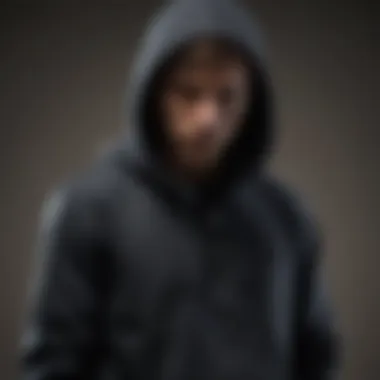 Silhouette of skateboarder wearing full zip-up hoodie in action