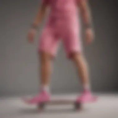 Skater performing tricks while wearing Nike pink shorts