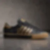 Stylized photo of black and gold Adidas skate shoes on a textured surface