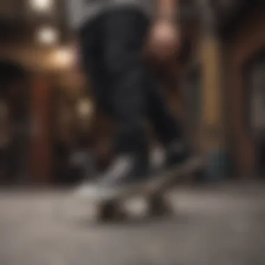 Skateboarder performing a trick while wearing black Converse shoes