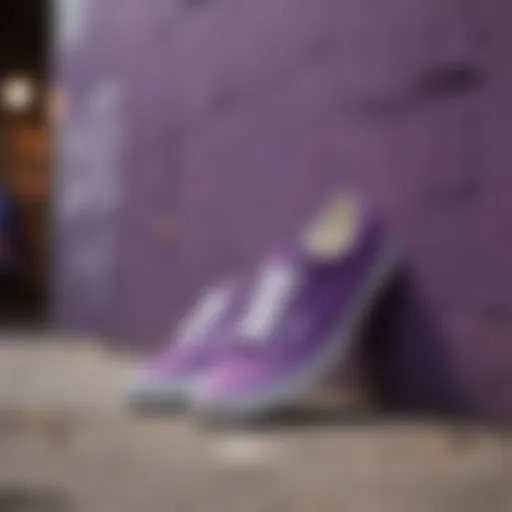 Vibrant purple Vans sneakers displayed against a graffiti backdrop.