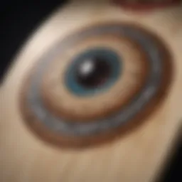 Close-up of a skateboard deck featuring unique artwork and hidden symbols.