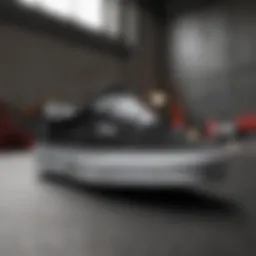 Classic black and white Vans on a skateboard