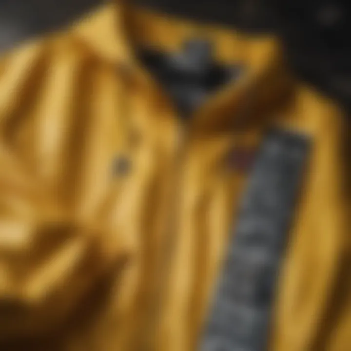 Close-up of a yellow windbreaker jacket with skateboard accessories