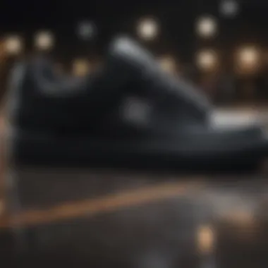 Close-up of black DC shoes showcasing intricate design details