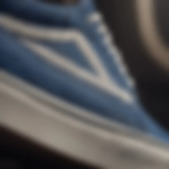 Close-up of intricate stitching detail on true blue vans