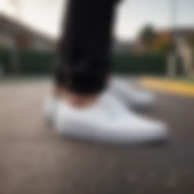 Skate Culture Staple: Vans Authentic All-White Vans Authentic All-White Shoes in Skateboarding Action