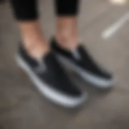 Elegant Vans black slip-on shoes