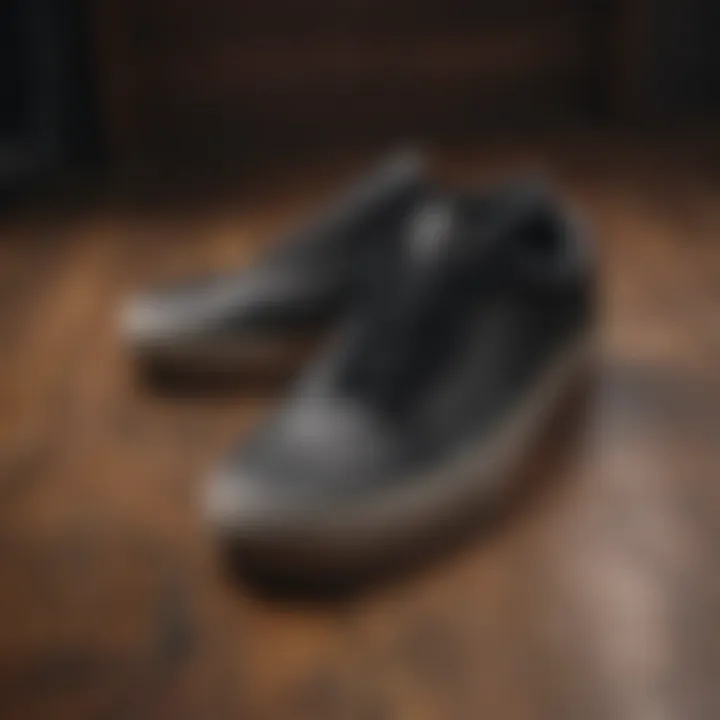 Stylish Vans Old Skool black leather shoes on vintage wooden floor