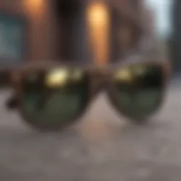 Classic Wayfarer sunglasses resting on a skateboard