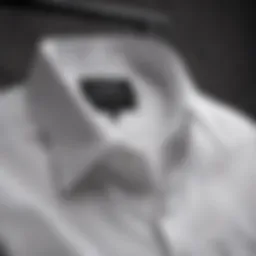 Elegant white button-down shirt on a hanger